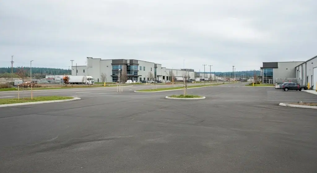 Industrial land sales near commercial warehouse buildings in McMinnville Oregon.